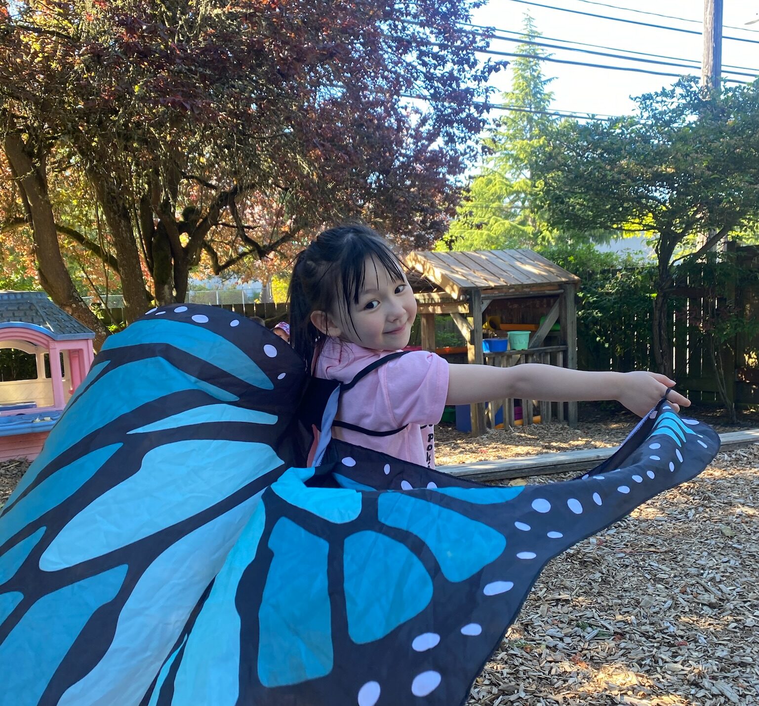 children painting outside